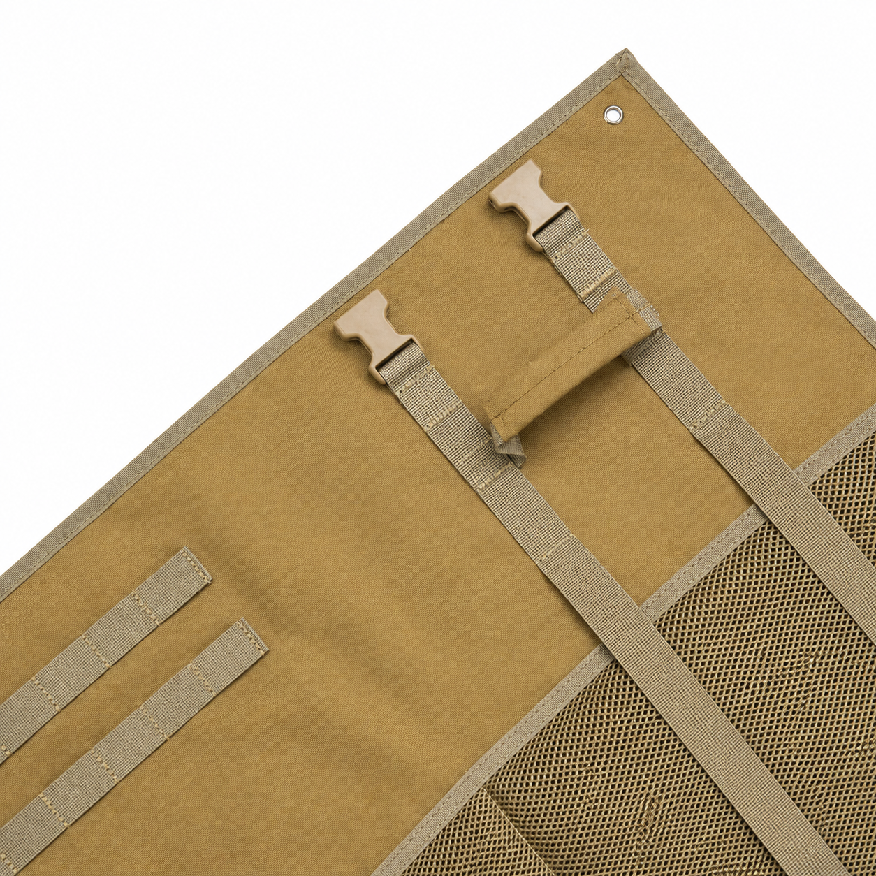 Close-up view of tan shooting mat interior showing fixed webbing, quick release buckles, a portable handle, and MOLLE attachment system for gear.